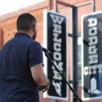 Kansas Poet Laureate Huascar Medina reads outside the Carnegie Center for the Arts in Dodge City International Festival in September 2019